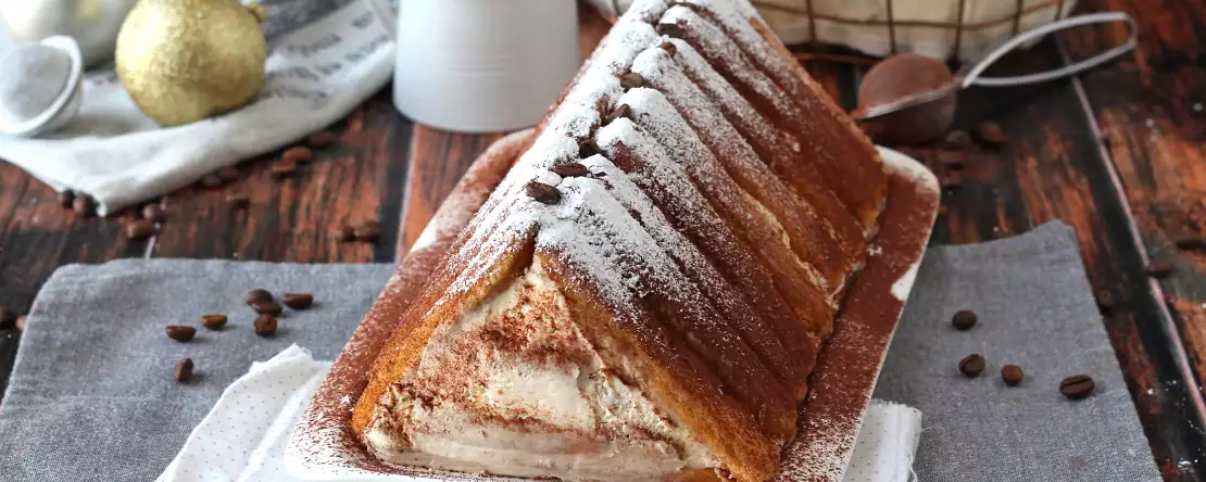 Um lindo tronco de Natal parecido com chalé