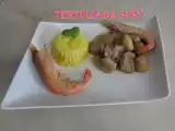 Receita Estufado de porco preto, camarão e castanhas com arroz de caril e hortelã
