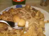 Receita Costeletas de cebolada com esparguete e cogumelos