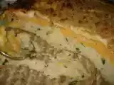 Receita Empadão de peixe com casaco de béchamel e broa aromatizada......