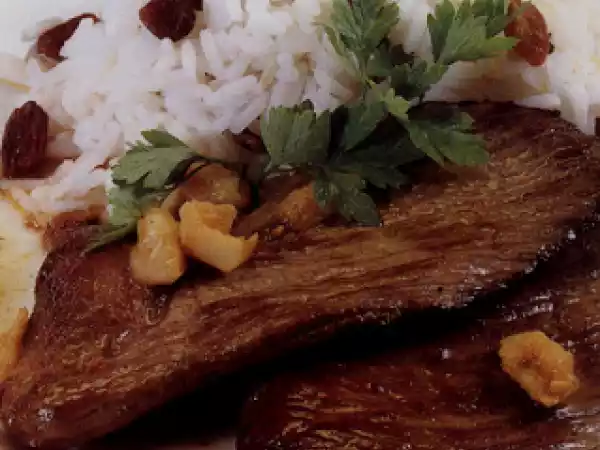 Receita Bife de novilho com arroz de passas