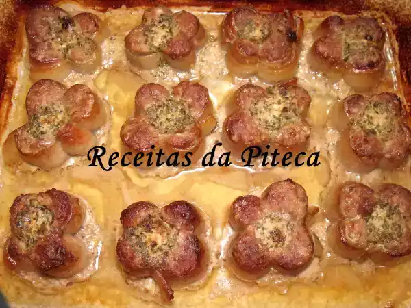 Receita Popietes de porco com manteiga, alho e salsa assadas no forno