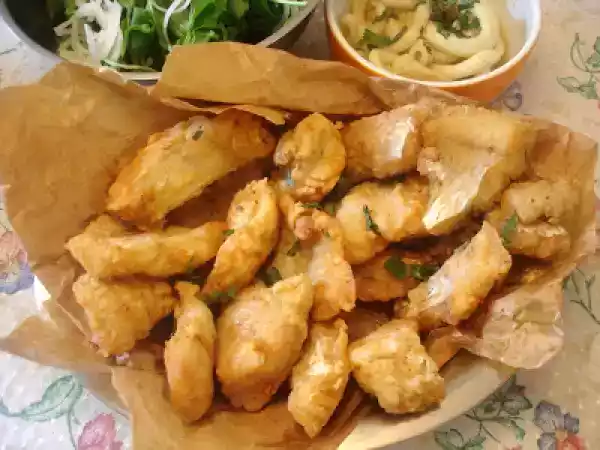 Receita Peixe frito com salada de rúcula