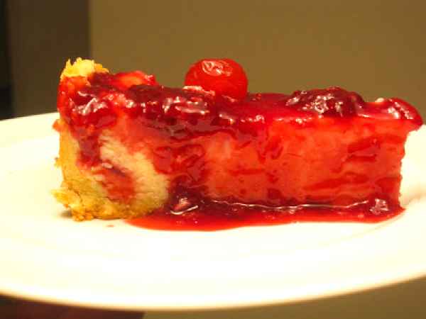 Receita O natal e a cheesecake com calda de frutas vermelhas