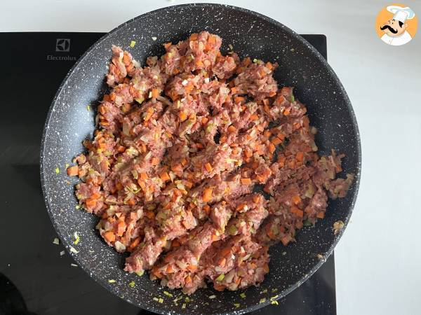 Trouxinha de repolho recheado com carne e legumes - Preparação Passo 4