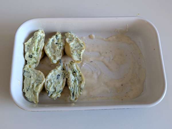 Conchiglioni recheado com ricota, curgete (abobrinha) e limão: cremoso e gratinado - Preparação Passo 7
