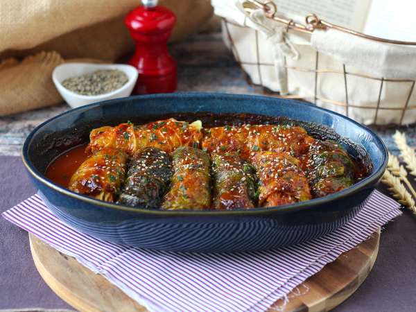 Rolinhos de couve-lombarda recheados com carne de porco e molho de mel e gochujang - Preparação Passo 10