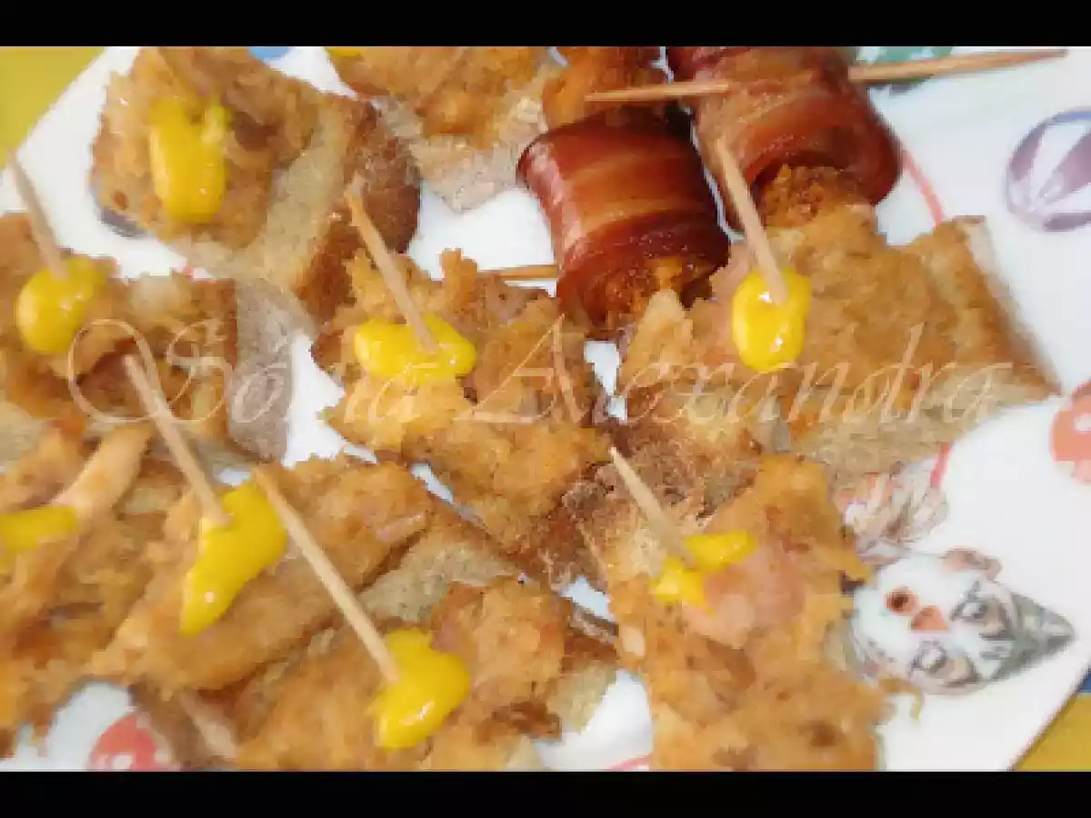 ALHEIRA GRATINADA EM PEDAÇOS DE PÃO DE MILHO COM PINGO DE MOSTARDA...