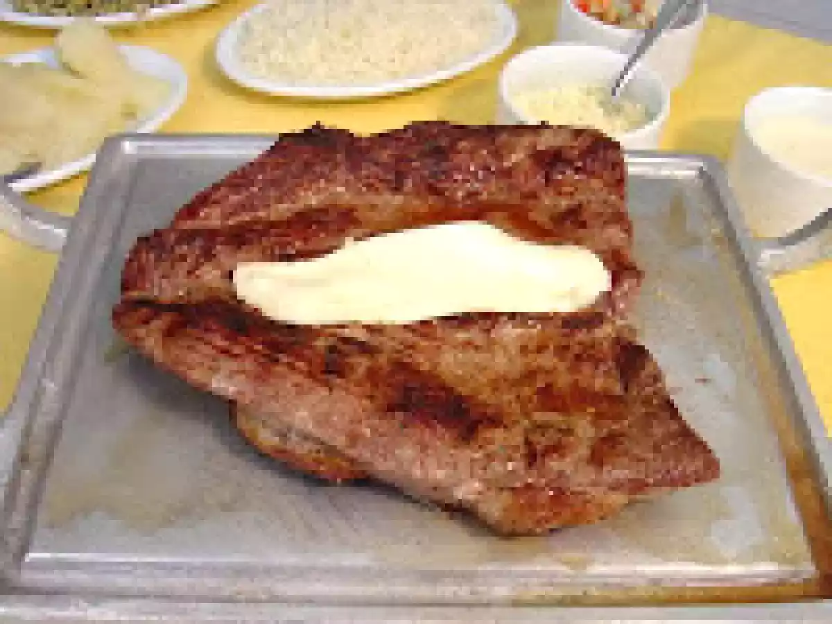 Bode assado na brasa