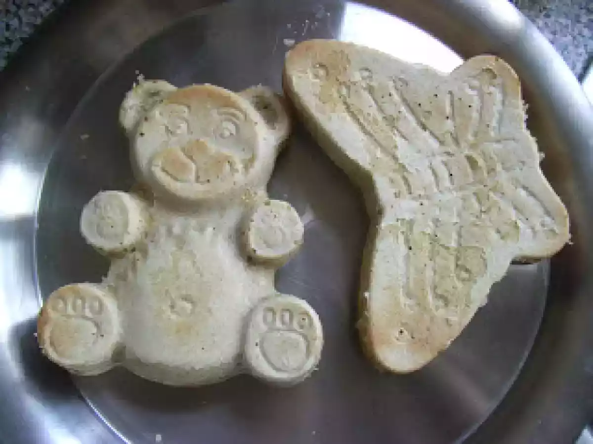 Bolo de leite em forma de urso e de borboleta. - foto 2