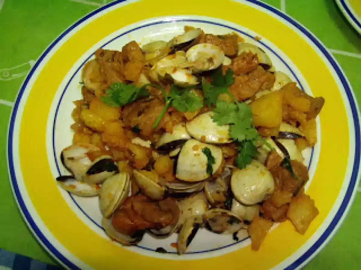 Carne de porco com ameijoas e laranja