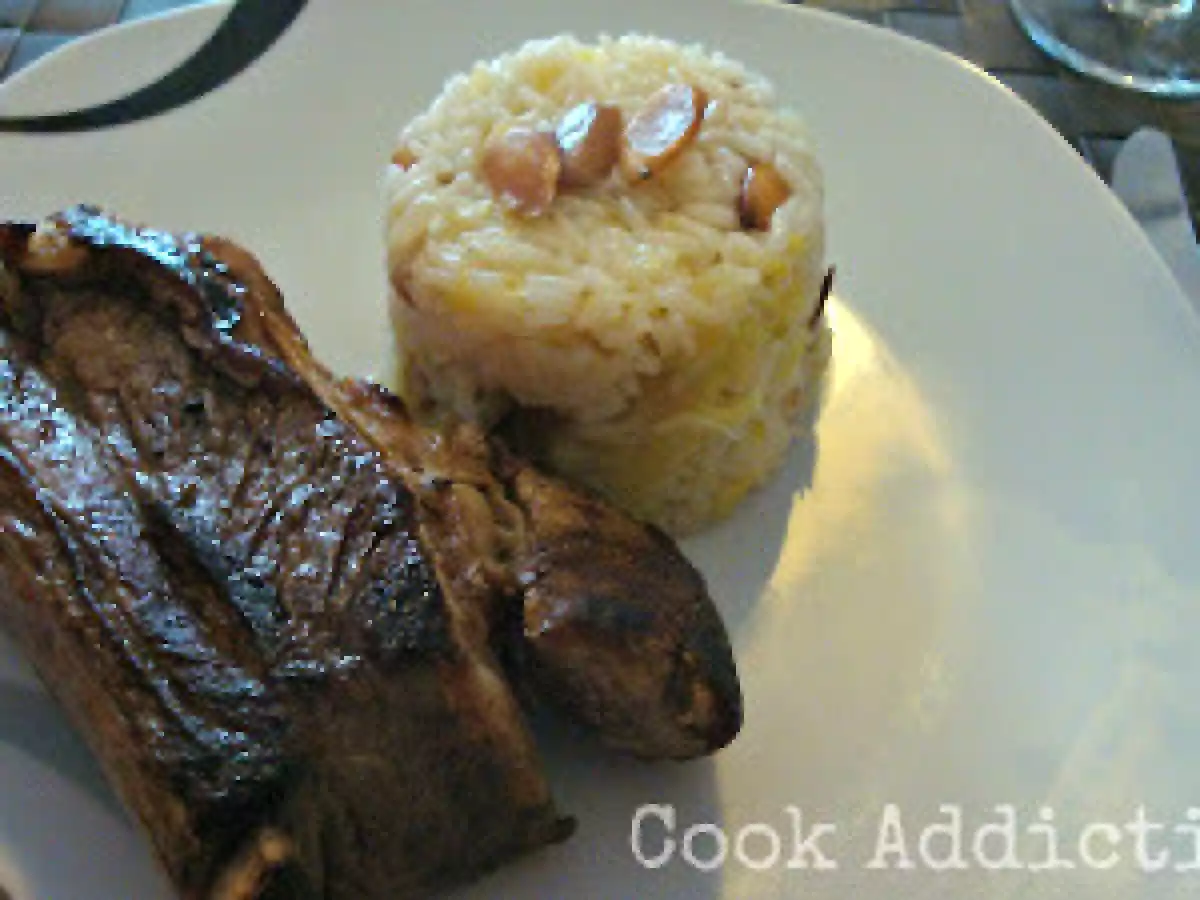 Costela de vaca grelhada com arroz de amêndoa e couve