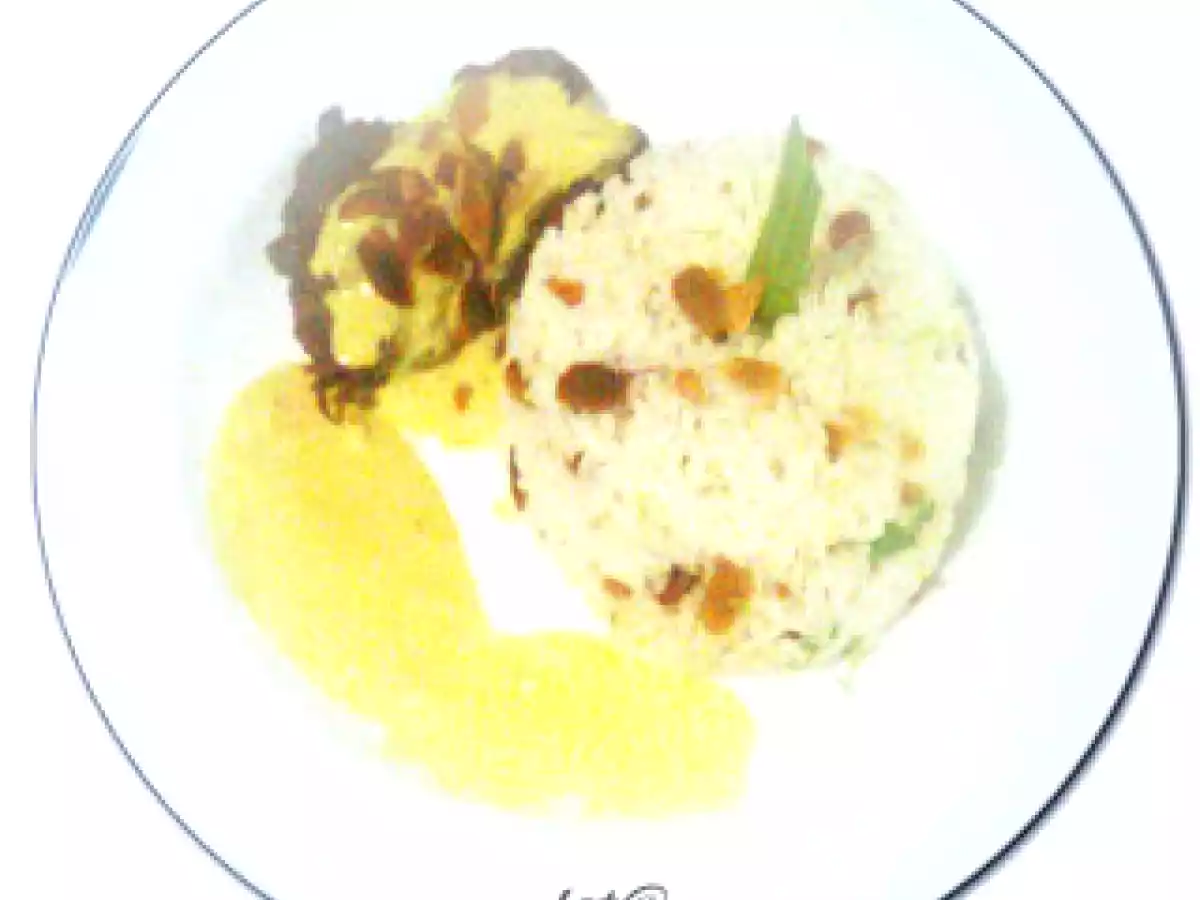 Filé com molho de mostarda, arroz com nozes e alho-poró