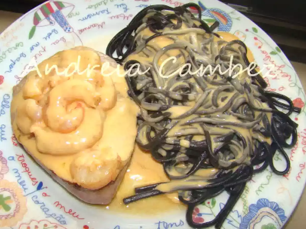 Medalhões de vitela com molho de lagosta e linguine al nero di seppia