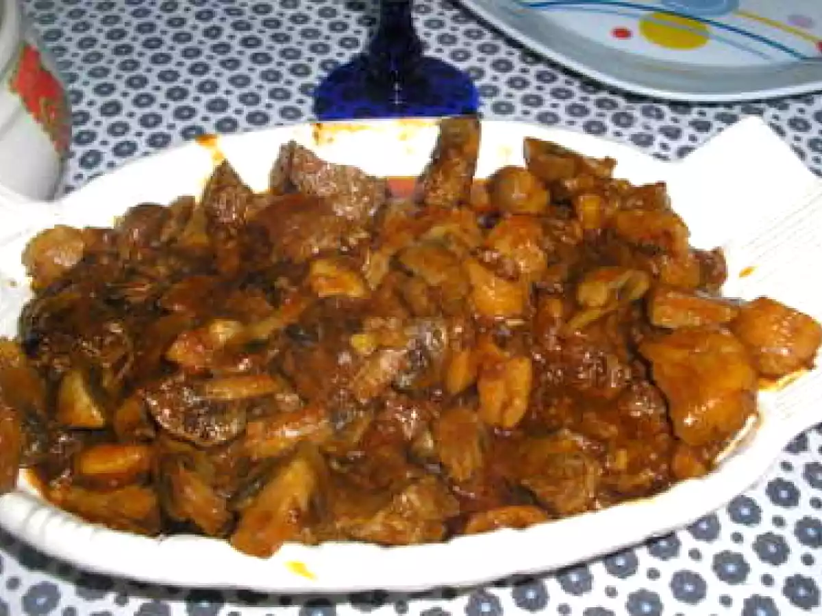 Novilho com castanhas e cogumelos