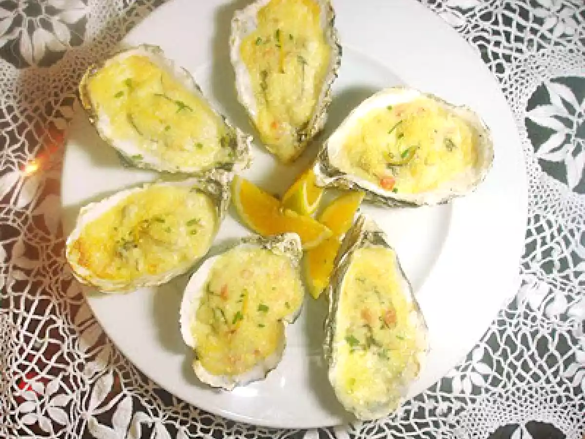 Ostras gratinadas com laranja, orégano e coentros