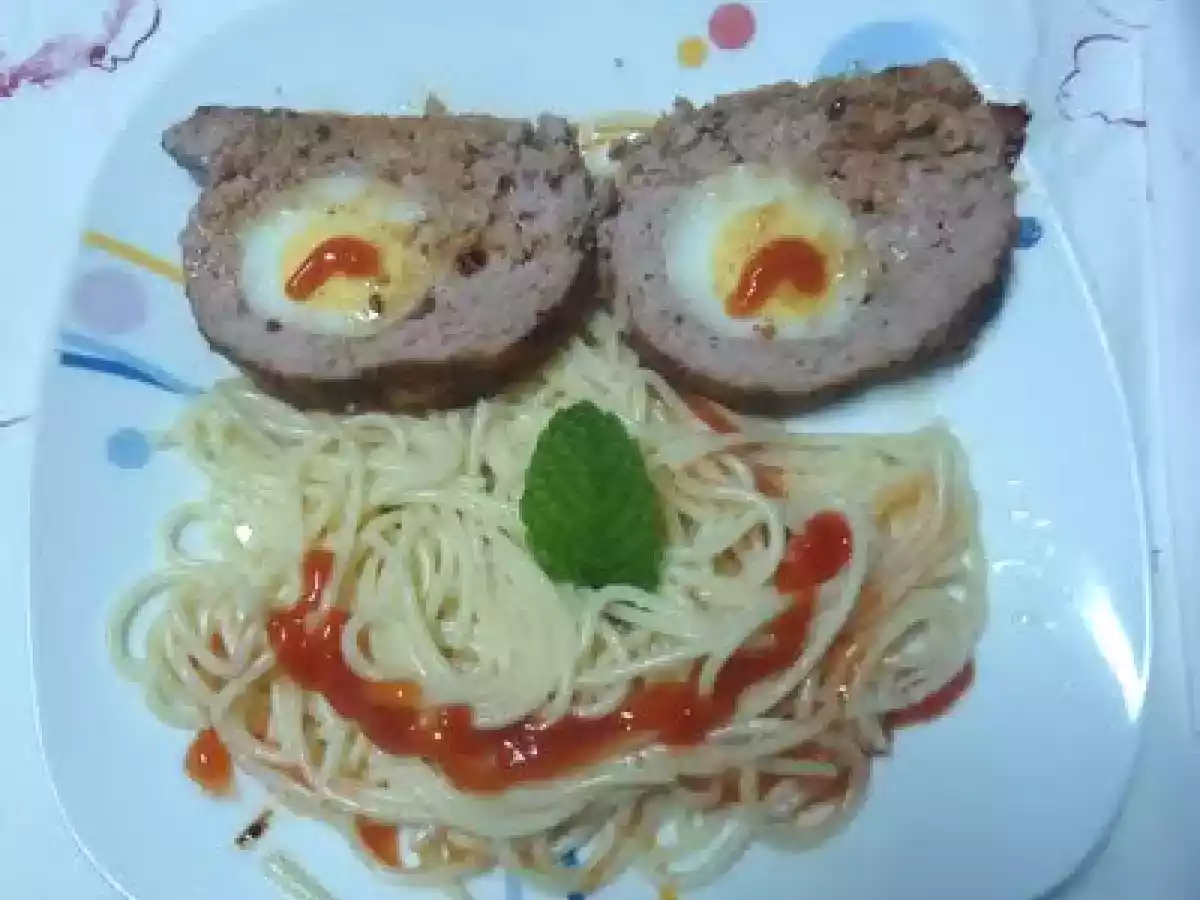 Rolo de carne com ovo cozido - foto 3