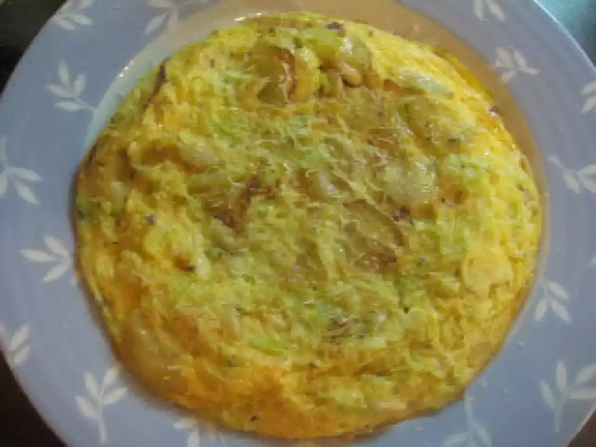 Tortilha de batata doce com alho francês, pinhões e parmesão